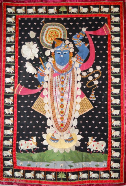 A finest hand weave on black back ground Pichwai of Sreenathji. 20th Cent. Size: Apx., 5' X 7'. Ask for more images, close ups and detail. Condition: excellent.

     