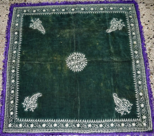A green velvet with needle work, table cover of 35" X 35" size. 1890/1900 AD.

See some stain in the middle, otherwise a fine condition piece.        