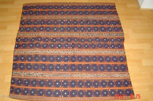 1930 south sumatra?
114cm x 108cm
with myriad mica mirrors
 very fine embroidery on very fine ikat cotton
natural colours pazyryk antique              