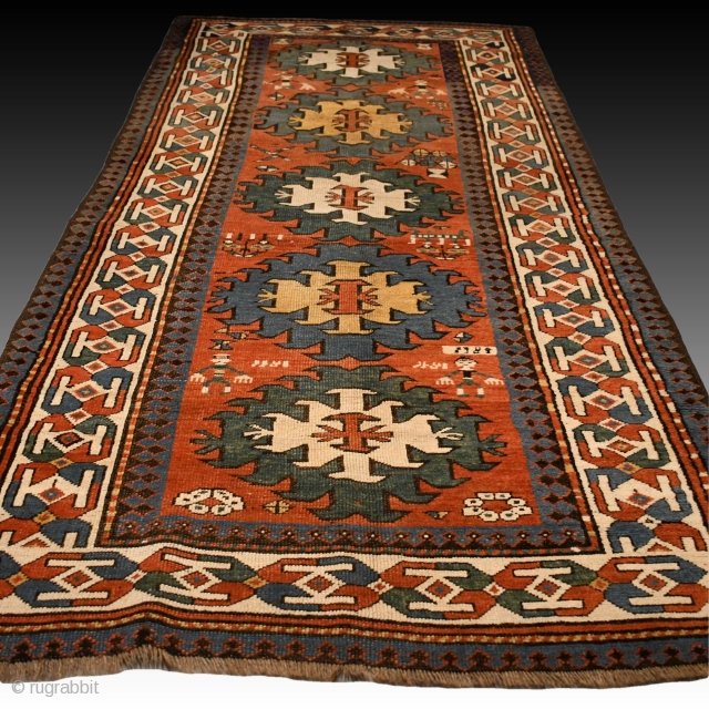 Antique Caucasian Kazak rug. Very good condition for it's age, normal wear. Wool on wool. Size approx. 257 x 113 cm / 8.4 x 3.7 ft.       