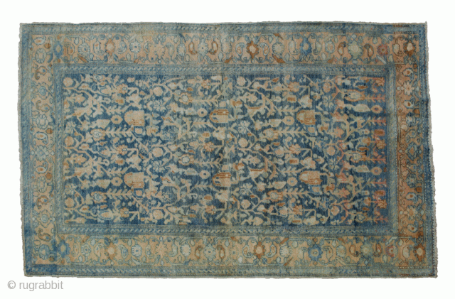 Stylish antique Malayer rug 202x127cm. An unusual royal blue background with all-over design and a paisley and flowerhead border with a change of colour at one end. It has soft shiny wool  ...