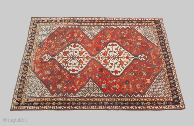 Impressive antique Qashqai rug 225x153cm with pomegranate design. Small areas of reweaving, otherwise in good condition.

More info: https://sharafiandco.com/product/antique-qashqai-rug-225x153cm/

               