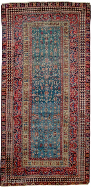 A most unusual Farahan rug 19th Century, 290x140cm, with a Turkish design.

There is a repair as shown in the image and the selvages are rebound. It is evenly worn which is in  ...