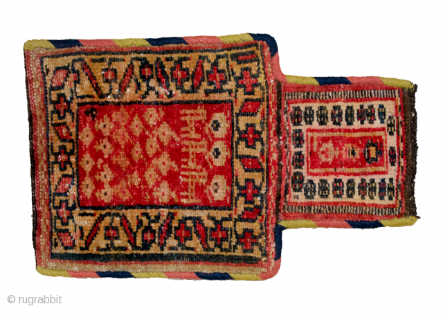 Sweet antique Kurdish saltbag 50x30cm.  The centre contains three dogs with stylised Paisley design. The binding has been redone, synthetic dyes.

More Info: https://sharafiandco.com/product/antique-kurdish-saltbag-50x30cm/

         