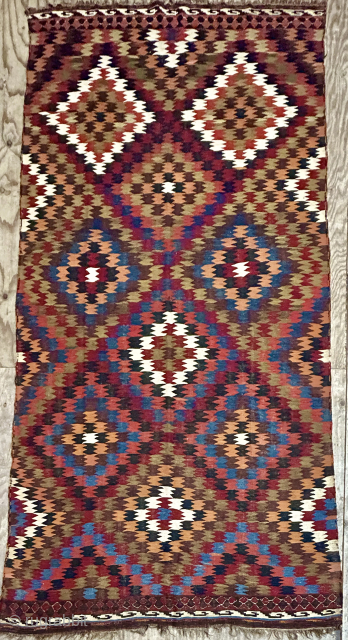 Beautiful antique eye dazzler large Varamin killm 354x180cm with saturated colours. It has a couple of very small tears but priced to go.
