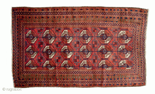 Unusual antique Baluch rug 217x130cm with a Turkman design woven on wool. The colour is mainly soft red with a beautiful shade of green in the border.  In generally good condition  ...