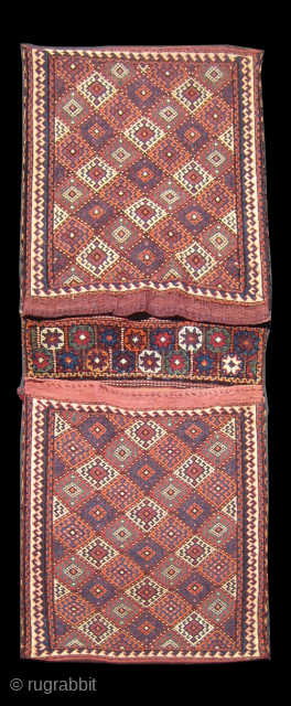 A magnificent saddle bag from the Kurds of Khurasan
Circa 1900, in mint condition 
Reds, blues, greens and ivory are the colours of this fine weft-wrapped bag
Dimensions: 170 x 70cm

    