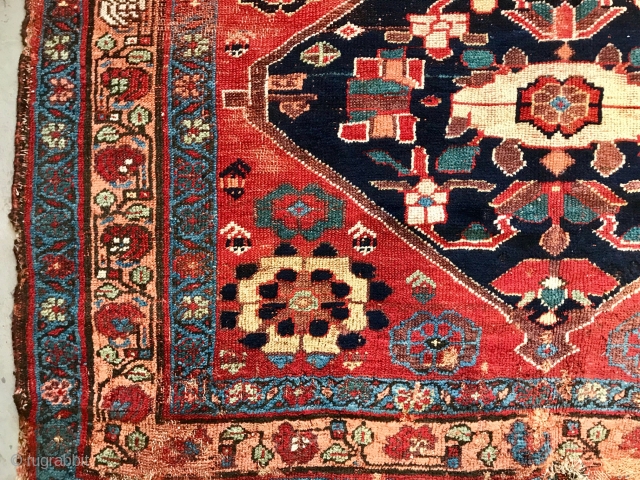 Old North west Persian rug with Minakhani references. Fabulous colors. Sporadic condition issues which shouldn’t bother serious collectors. Or a smart decorator. Or a regular person.       