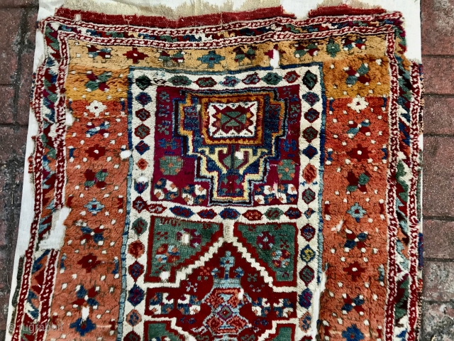 Calling friends of East Anatolian weavings…A well mounted on linen, complete but fragmentary old Yuruk. Actual colors a bit softer…
Write to shivny@yahoo.com for further details.        