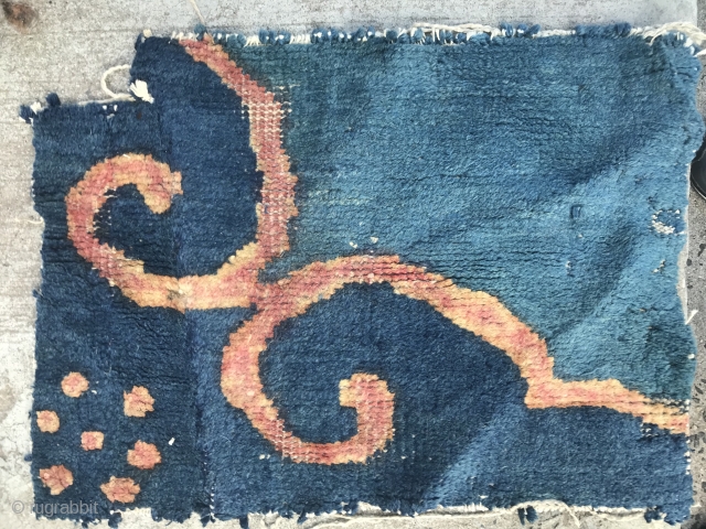 A piece of a Chinese rug to meditate on. That is meditate on the content of the piece. Not ON the piece. First the dots.  Then the scroll. Or vice versa.  ...