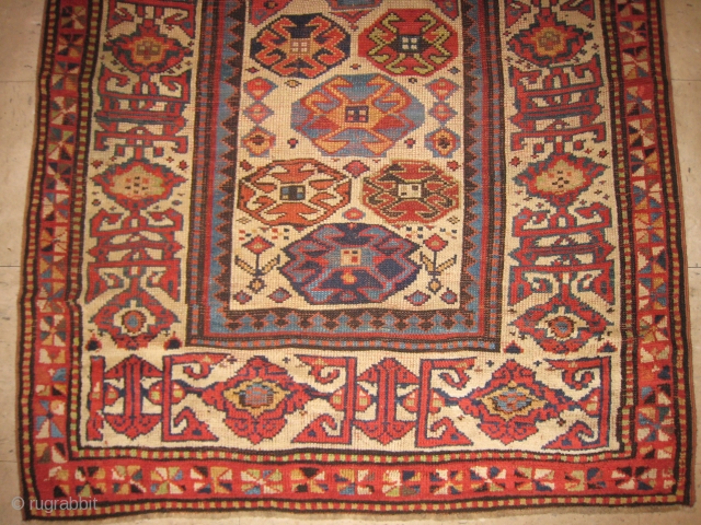 A Caucasian Long Rug with Kufesque Border                          
