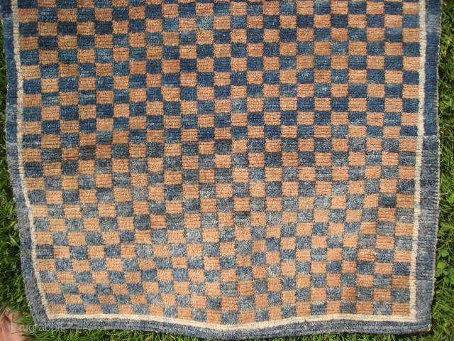 A Tibetan Checker Rug                             