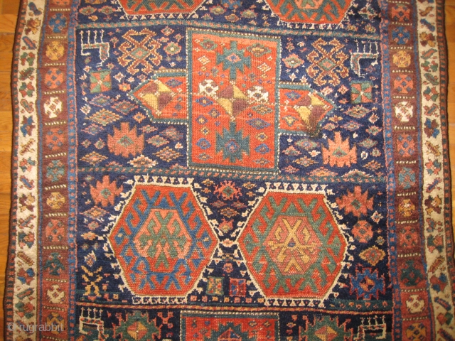 A small Kurdish main carpet.                            