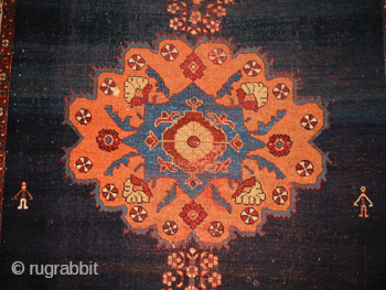 An Old Afshar Rug on an open blue field                        