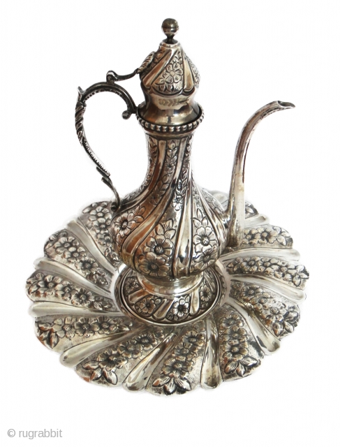 AN OTTOMAN SILVER EWER AND BASIN, PROBABLY EGYPT, 19TH CENTURY 


Condition Report :  Ectremly fine head cover attached with handle is broken and repaired in its original condition    