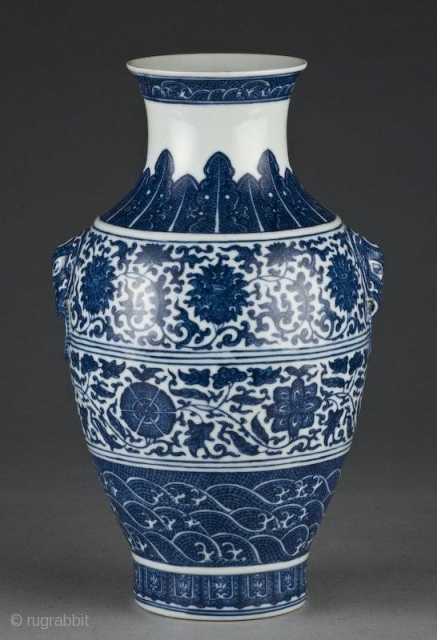 
a Chinese blue and white porcelain vase depicting lotus blossoms, having two elephant head handles , mark on the bottom. 12.25"H Circa - 19th Century or earlier .


Condition report

INTACT    