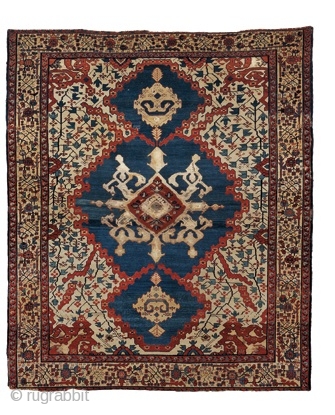 Despite its almost tribal feel, this unusually small Bakshaish carpet, 7'2" by 6'1", is probably the product of a Northwest Persian atelier. Like many early Northwest Persian rugs, the colors are beautiful,  ...