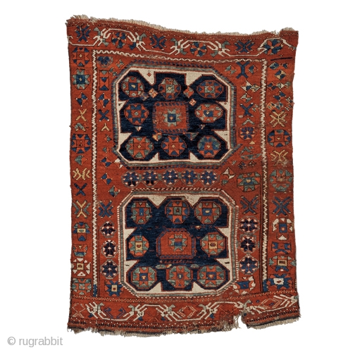 Anatolian rug, 4'2" by 3'1", with great color saturation, lustrous wool, and wonderfully inventive drawing. Even though it has a classic “Ezine” design, this sweet little rug has a much more tribal  ...