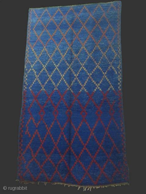 Beautiful antique bleu berber rug Beni Mguild from the Middle-Atlas of Morocco..100% wool woman handmade..Size/ 330 x 190 cm

Samir Souiyat
ATLAS KILIM BERBERE
www.atlaskilimberbere.com           