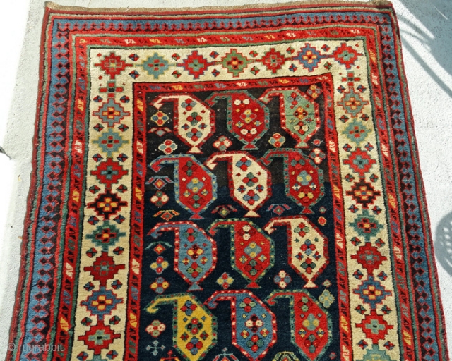South Caucasian carpet, late 19th C. in very good condition, with only very minor breaks on the edges.  8'4" inches long x 3'5 wide(254cm x 104). Blue and brown field with  ...