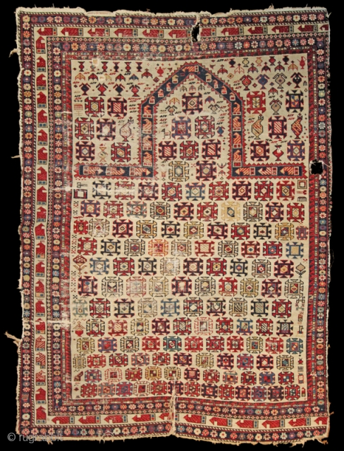 Marasali rug Late 19th Century with great colours on an ivory field.  Obviously more of a fragment due to missing quite a lot of borders on one side.  Has a  ...