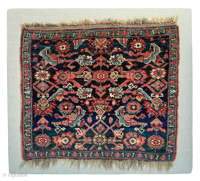Antique Bidjar bag face, circa 1890, that has been carefully sewn onto a hessian wrapped wooden frame, which can be hung on a wall as a piece of rug art.

The size of  ...