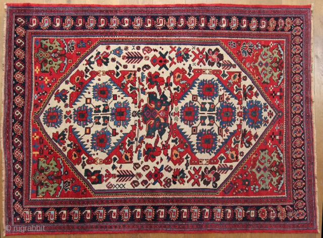 Antique Afshar, late 19th century 1.68 x 1.27m  Excellent condition all over with a good glossy wool pile.  Some small lower areas of wear in the main ivory field, see  ...