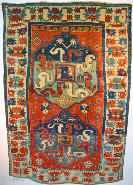 Exceptionally beautiful Chelaberd Cloudband Kazak. Circa 1850 or earlier. Full pile, original condition. Tribal, archaic, needs few words, maybe "UNIQUE"?......color palette?....!!! 
size 6'8"x 4'8"         