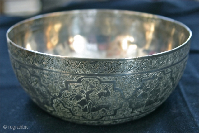 Sterling Silver 19th c. Persian Bowl
Hand Engraved / circa 1870 - 1890 / ?
Size; 5" x 2&1/8th"
Very attractive, mint condition,
9 scenes in the style of Persian minatures,
There is an elephant being ridden  ...