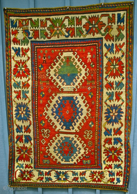 Really Old Bordjalu Kazak / First half 19th c.
Love the drawing of the borders, craft of the weaver, and it's slightly wonky sensibility.  The three little guys in different colors is  ...