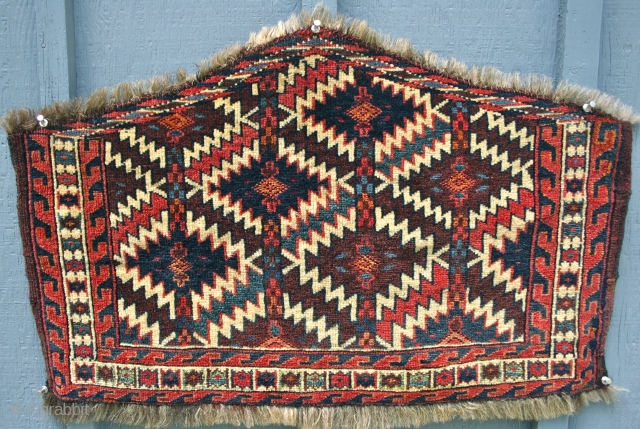 Small asmalyk, circa 1875.
WONDERFUL colors, real green. Great graphic. Soft lustrous wool. I wonder....were these for baby camels? ;-)
Some old village  repair to the upper left edge. 
Size: 13" & 18"  ...