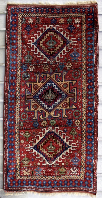 Antique Kuchan Kurd, circa 1875. This rug has wonderful saturated color and long silky shiny wool. The drawing is free and dynamic showing a great sense of freedom and imagination. The wefts  ...