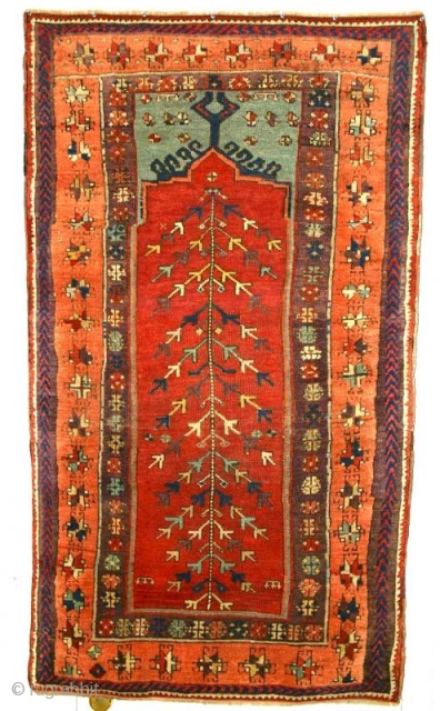 Yuruk Prayer Rug, circa1875 Kagizman, (perhaps Sivas). Intact, no major repair, a powerful totemic piece with exceptioanal color.               