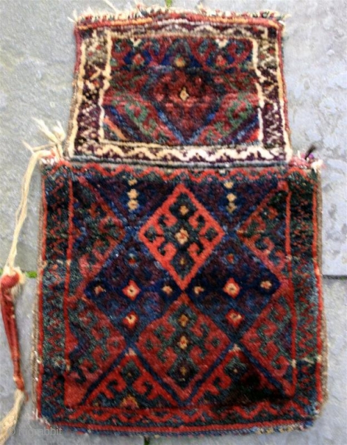 Antique Jaff Kurd pile salt bag. circa 1900. 23" x 15" Good dyes, (especially the purple). Woven in one piece.             