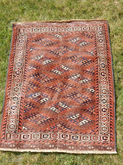 Small Yomud main carpet. Possibly a wedding rug.   Field is full of dyrnak gulls. White, rust, blues and browns compete in this excellent example of Turkoman art. Measures 3ft 6in  ...