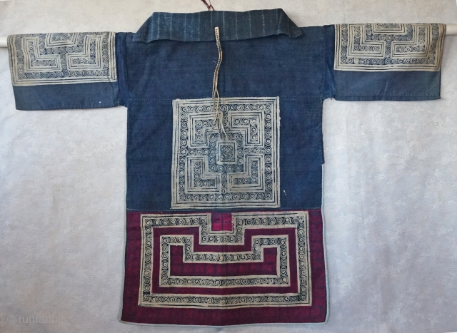 Antiuqe Chinese Ethnic minority summer festival top
hand batiked, hand embroidered, indigo dyed worn for festivals...
short in back long in front...             