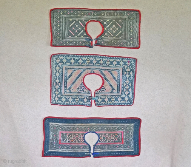 Rare Chinese Ethnic Minority Children's collars Late Qing 

These 3 collars were originally the collar portion and were sewn to a lower section to forming a child's pinafore... Home spun yarns intricately  ...