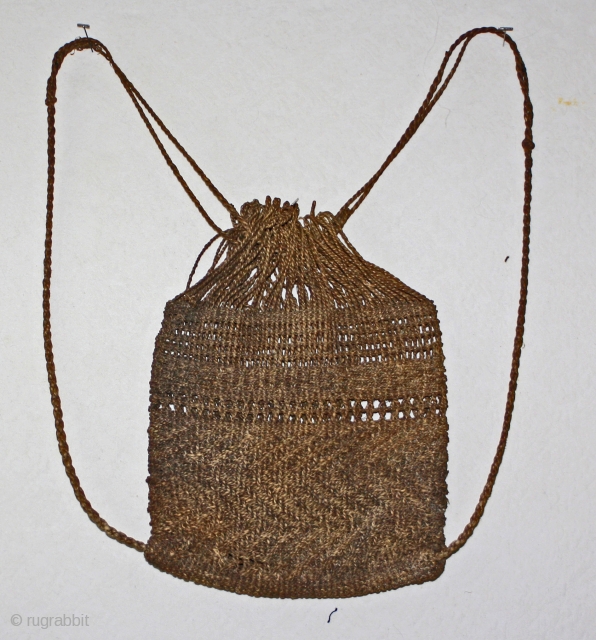 Antique Japanese fisherman's knapsack, backpack...          
This antique Japanese small drawstring fisherman's bag is woven from hand rolled cording using indigenous natural plant fibers.  ...