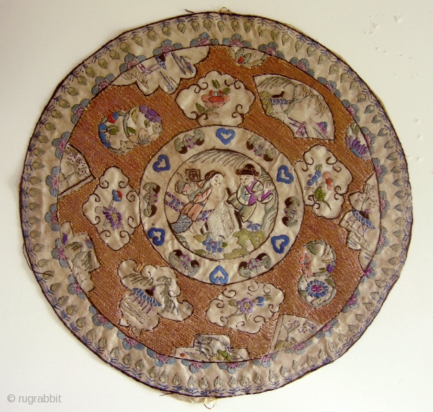 Lovely silk embroidered rondel cut from an antique 19th century Chinese robe. Intricate satin stitch depict 2 figures in the center surrounded by gold bouillon tread used for couching background. Diameter is  ...