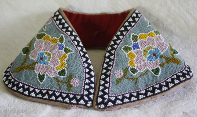 TC394  This antique beaded headband is from Guang Dong province in China, and is typical of headgear worn by Chinese woman around the turn of the 19th-20th century. It would have  ...