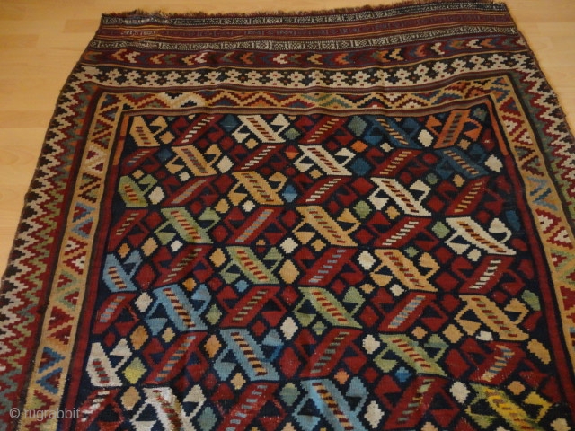 Antique  and  rare  fine persien Waramin Kelim  155 X 238 cm.

Beautiful natural colours , very rare pattern , a part few old repairs

in the borders , good   ...