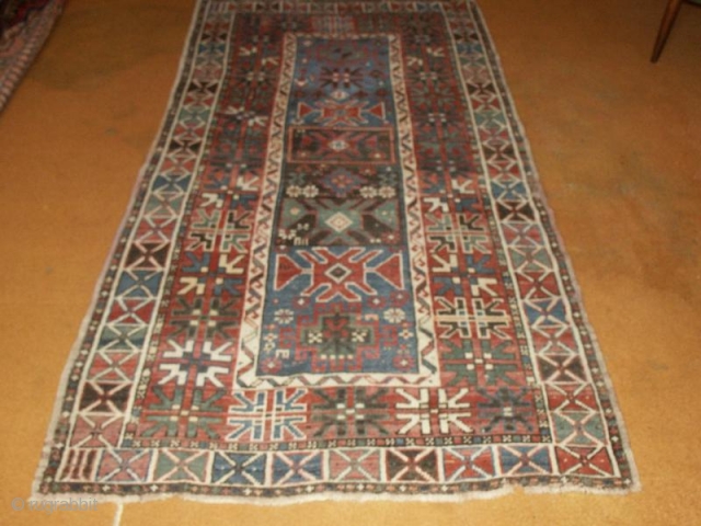 

   Nice old Kasak  96 X 177 cm,with pastell colours
   good condition.75                