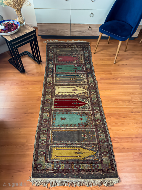 A Rare Heritage: Antique Kayseri Saf Prayer Rug (235x85 cm / 7' 8" x 2' 9")
Description:
A distinguished piece from Anatolia's deep-rooted weaving tradition, an exquisitely crafted treasure from Kayseri: This is an ...