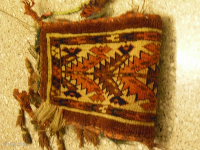 small Jomud bag *  damaged, dirty and with stains * knotted on goats hair and wool * made around 1900 * shipment worldwide possible        