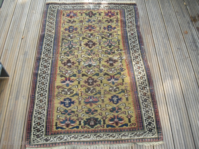 Antique gold yello ground Daghestan or Kuba rug Fragment - rare piece - several old restaurations + rewoven parts - around 2nd half of 19th century - shipping worldwide possible   