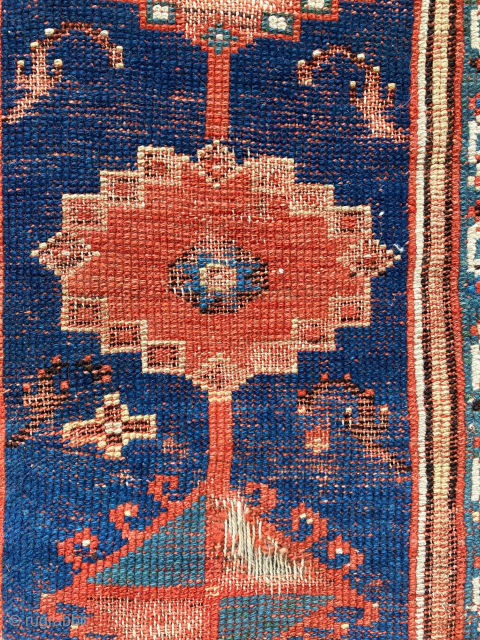 Antique West Anatolian rug, 4' x 6'2, Makri region, mid nineteenth century or earlier. Scattered areas of wear and damage with losses to the ends and sides (see photos). More than half  ...