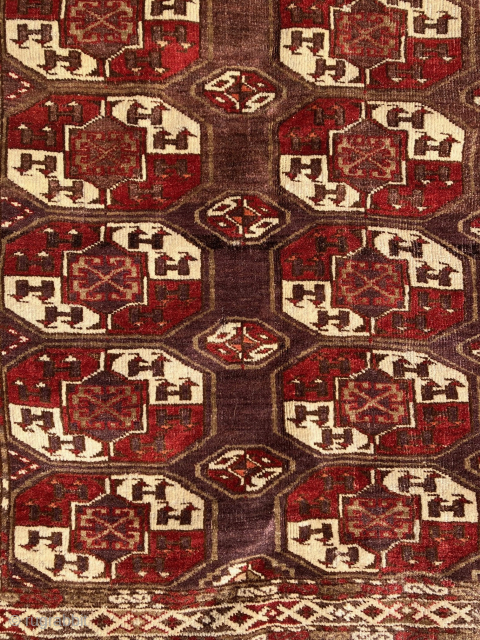 Antique Chodor Turkmen carpet, 5'7 x 10'1, 1850-1880. Wool goat hair warps and white cotton wefts typical of Chodor weavings. Thick, velvety pile in saturated deep burgundy red, purple, and soft, khaki  ...