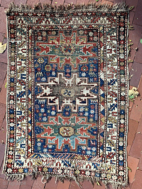 Antique East Caucasian Dagestan rug with Lesghi star design, 3'4 x 4'8. Low even pile with some areas a wear and corrosion of black in the central star and adjacent borders. Natural  ...