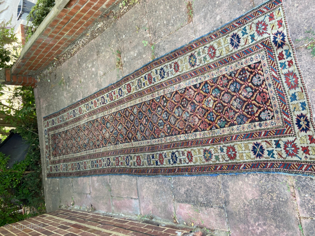 Antique Kuba runner, dated 1842. Good condition. Missing ends at top and bottom. Otherwise nice pile. Some localised wear in central field. Pile thick throughout around border. Worldwide shipping $45 unless ...