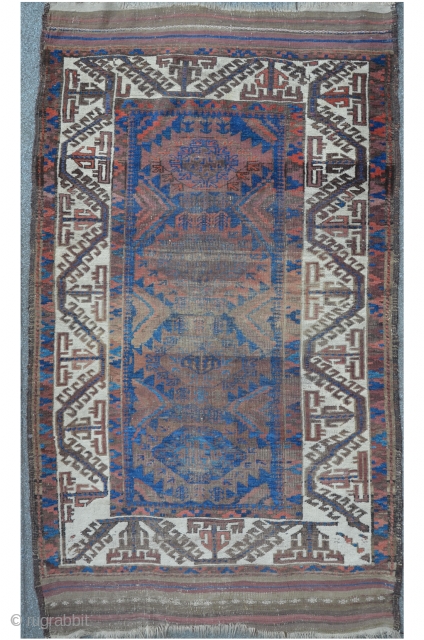 Exceptional Baluch with white ground Boat border and beautiful Kilim ends. 184 x 101 cm. Mythology and pattern research suggests;..the ability of the soul (Boat) to sail and to anchor (hooks) on  ...